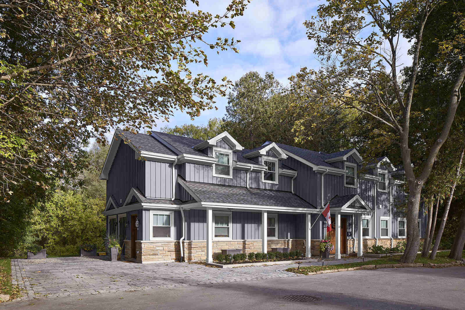 Exterior home renovation in Markham with river behind house