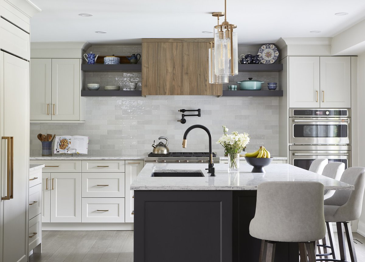 Kitchen centre view with contemporary range hood and island