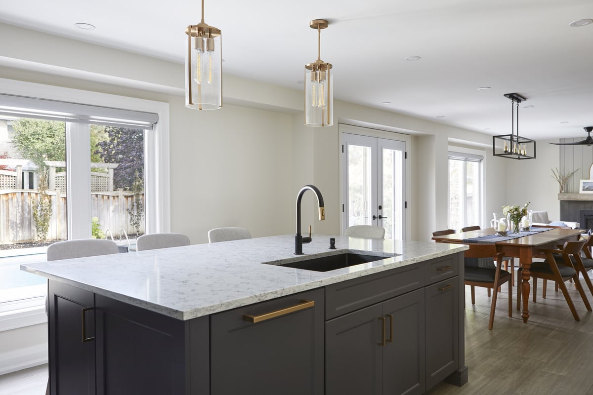 Kitchen island with dining table view in Markham home renovation by Master Edge Homes