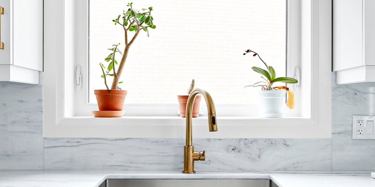 Kitchen renovation sink with brass faucet and stainless steel bowl 