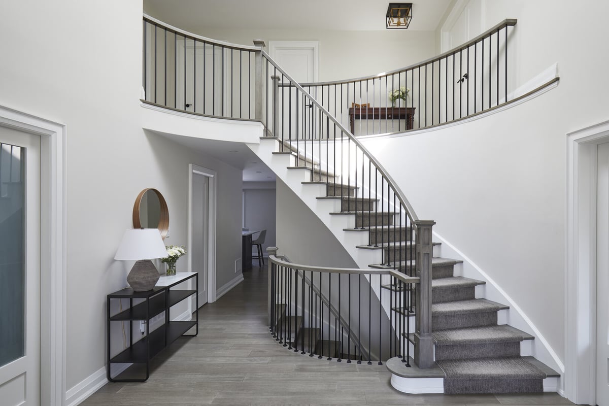 Markham home renovation with curved staircase in foyer