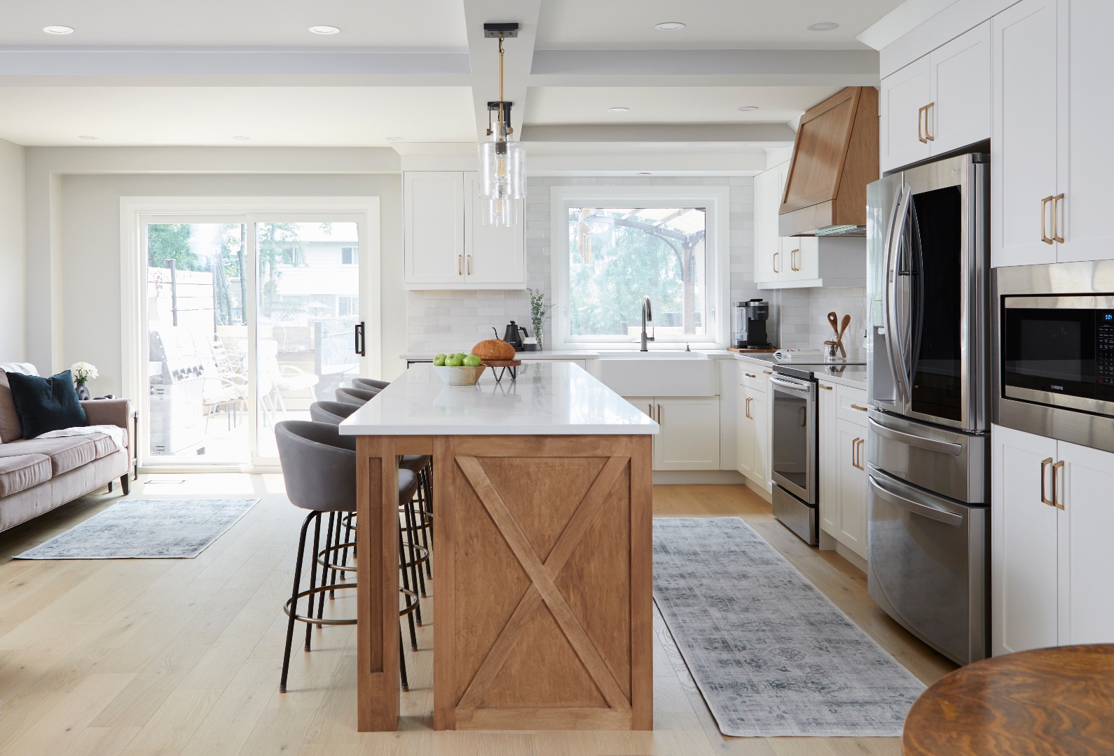 Side view of galley kitchen with white shaker cabinets in Markham