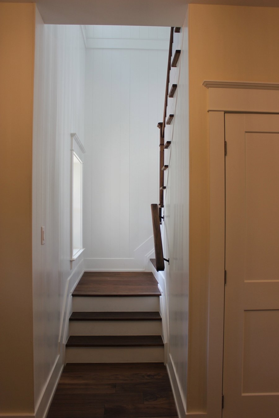 View of new staircase in Markham home renovation from main floor